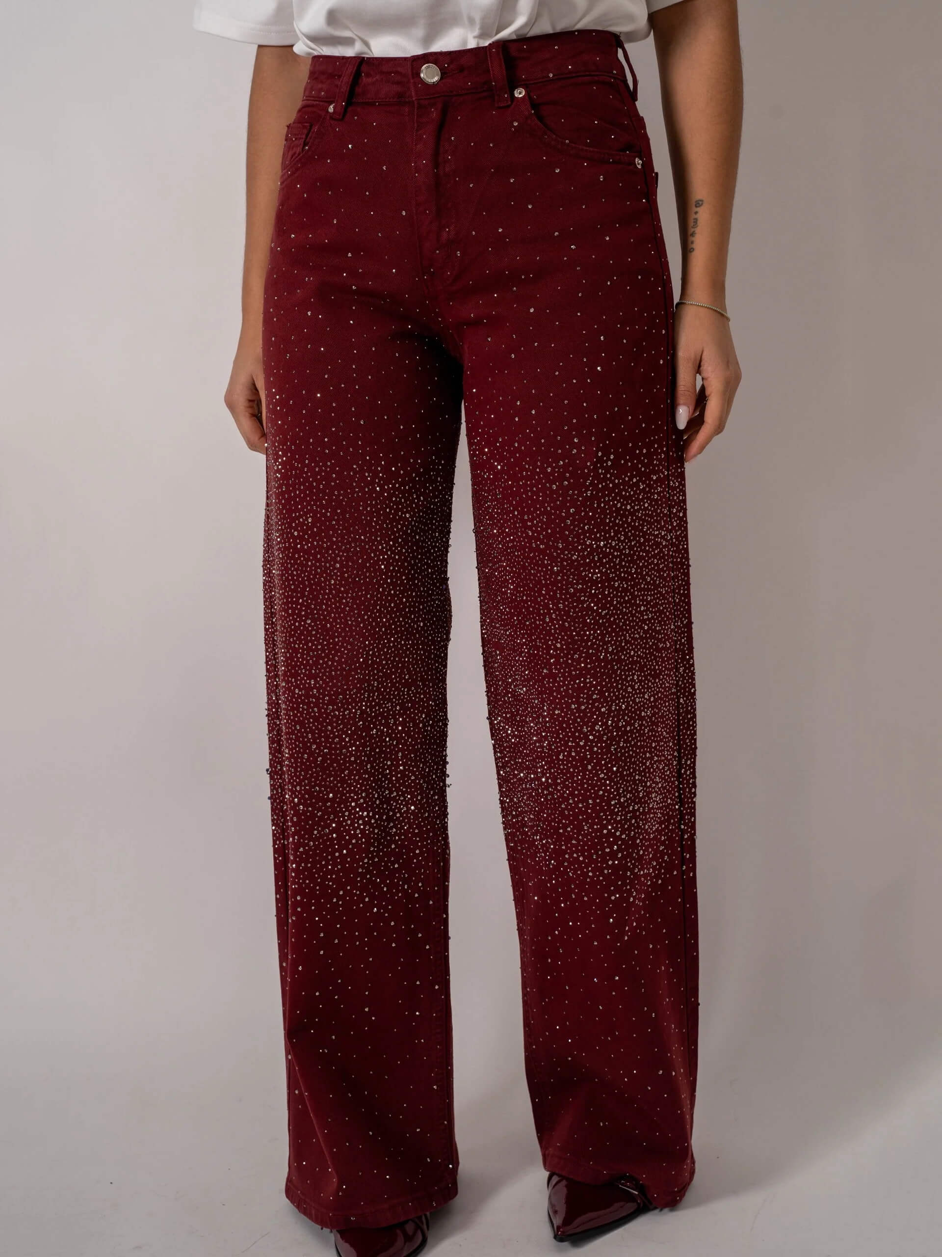 Jean en denim pailleté bordeaux